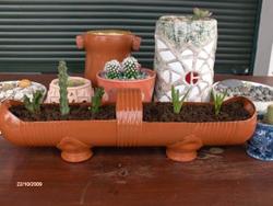 Кашпо для цветов и держатель для туалетной бумаги из пластиковых бутылок